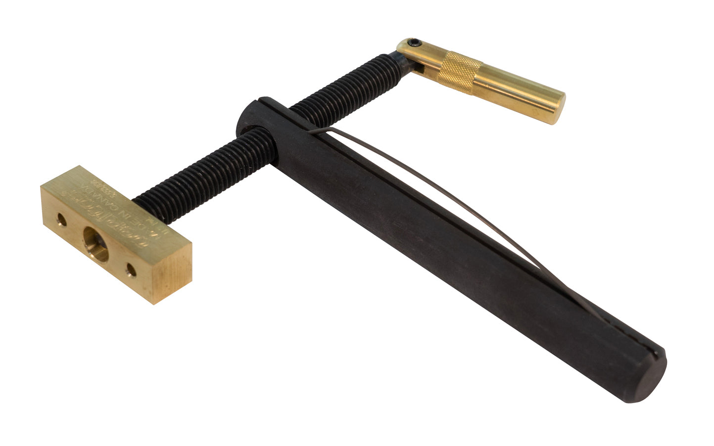 Veritas "Wonder Dog" installs in a 3/4" hole; pivots in any direction clamping is required; easy-adjusting handle provides clamping pressure in any position. Post is 6-1/2" long & is drilled & tapped at a 3° angle; side spring adjusts clamp head at any desired projection. Model 05G10.01. Bench dog Made in Canada.