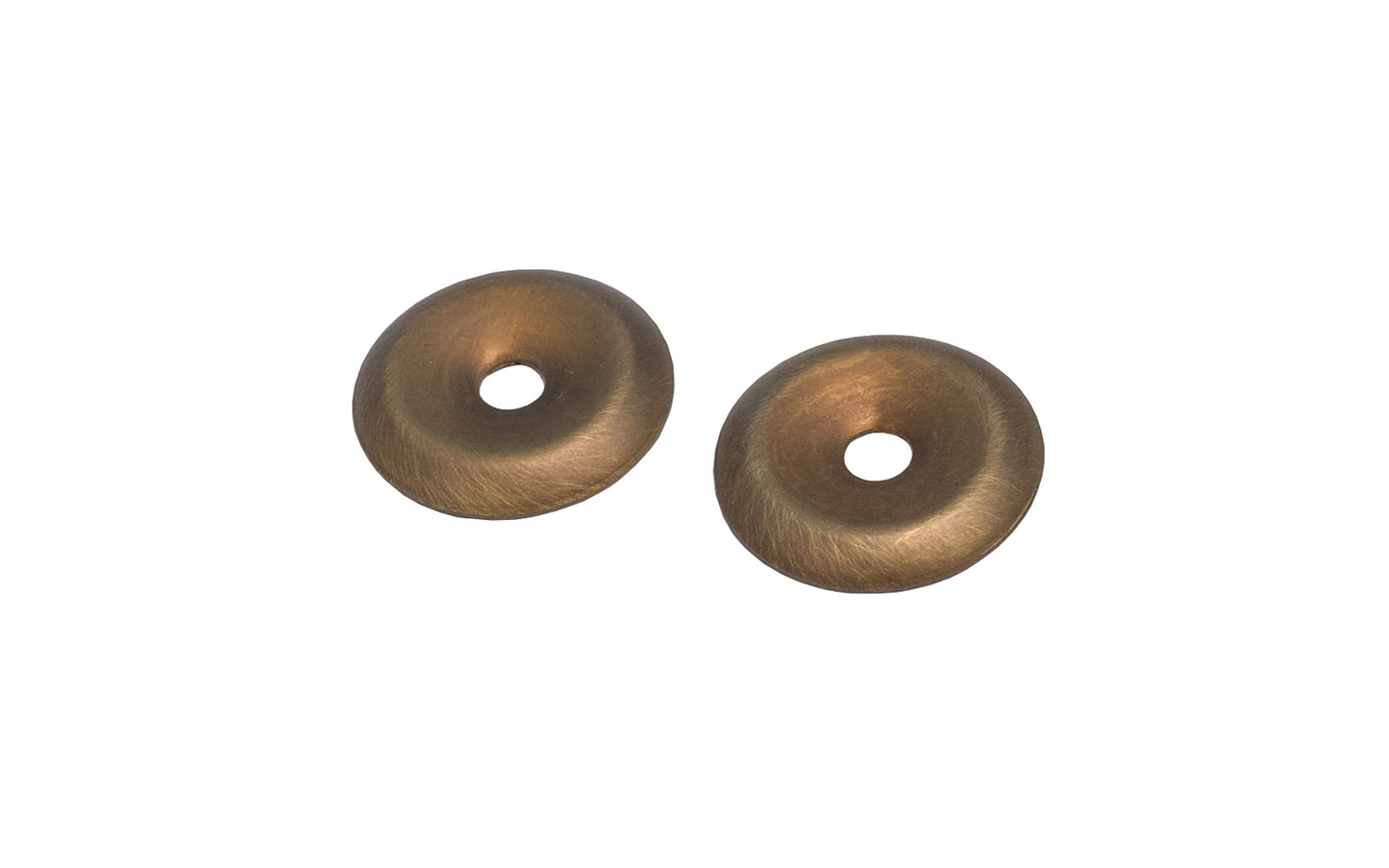 A stamped brass 7/8" diameter backplate with a small cup in the center. These finishing washers serve as back plates for knobs, bail sets etc. Sold as one pair.