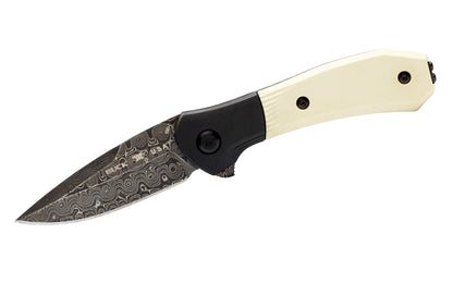 Buck Knives 590 Paradigm Folding Knife with Damascus Steel. Blade has raindrop pattern Damascus steel. 3" long blade. "Ivory G10" handle with DLC coated bolsters. Model 0590IVSLE-B. Pocket clip attached.  Made in USA. 