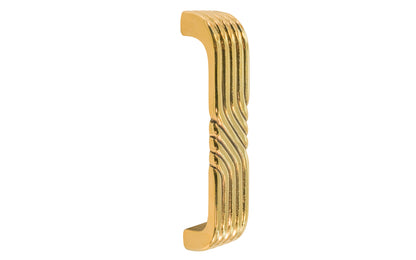 Vintage-style Hardware · A classic solid brass "Art Deco" handle pull with a streamlined 1930's look. 3-1/2" On Centers. Authentic reproduction pull designed in the 1930's, Streamline, Machine Age, Art Deco style of hardware. 3-1/2" center to center. Unlacquered brass (will patina naturally over time). Non-lacquered brass. Un-lacquered brass.