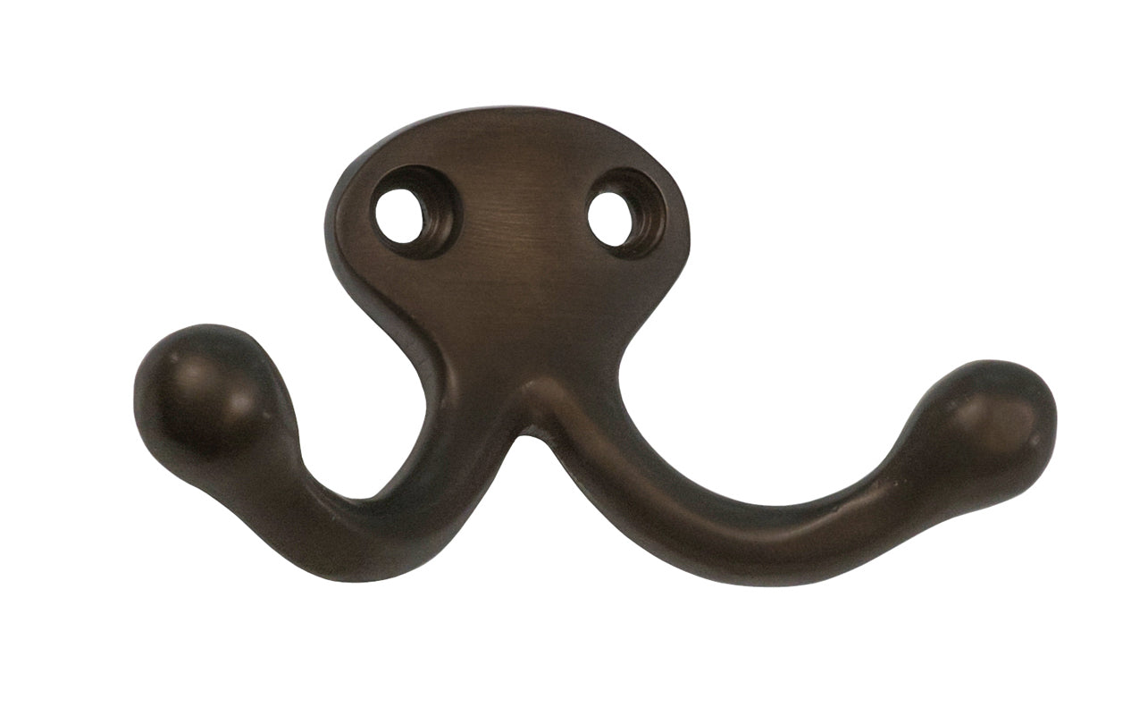 Ives classic solid brass double wardrobe hook. Great for kitchens, bathrooms, hallways, furniture, cabinets, bedrooms. The two prong hook is made of solid brass material, making it durable for clothing, towels, bags. Oil Rubbed Bronze Finish.