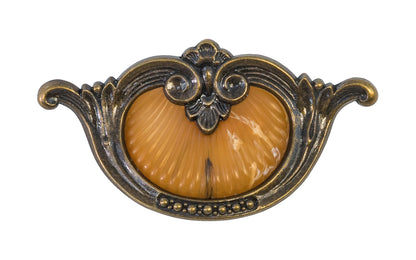 Waterfall-Style Drawer Pull With Bakelite ~ 3-1/2" on Centers. A special & unique drawer pull designed in the "Waterfall-style" / "Art Moderne" style of hardware popular in the 1930's. The handle pull is made of durable zinc material with an antique brass finish, & a bakelite insert inside. 3-1/2" on centers.