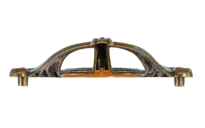 Waterfall-Style Drawer Pull With Bakelite ~ 4" on Centers. A special & unique drawer pull designed in the "Waterfall-style" / "Art Moderne" style of hardware popular in the 1930's. The handle pull is made of durable zinc material with an antique brass finish, & a bakelite insert inside. 4" on centers.