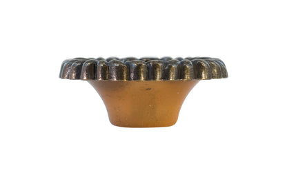 Waterfall-Style Cabinet knob with Bakelite originally designed in & the "Waterfall-style" and Art Moderne style of hardware popular in the 1930's. 2" diameter knob.