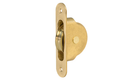 High quality sash pulley designed for sash or hung windows. Formed of solid brass material. Regular size. 2-1/4" wheel diameter. Unlacquered brass (will patina over time) non-lacquered brass.