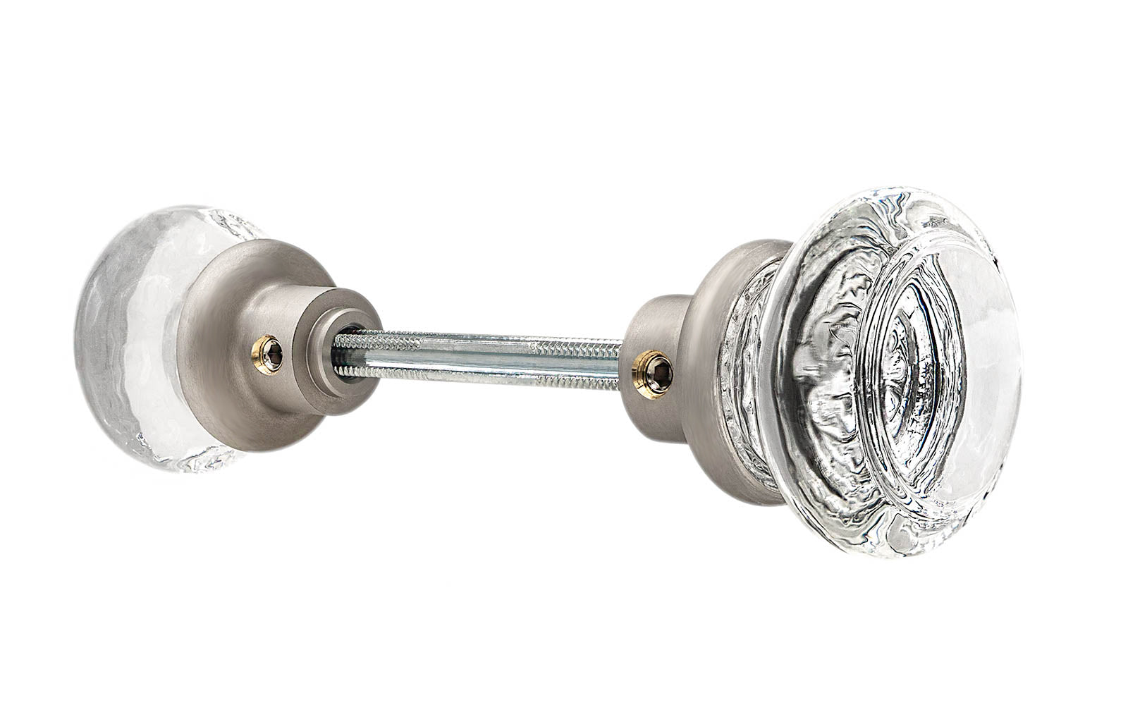 Pair of Classic Round Clear Glass Doorknobs with spindle. A high quality & genuine glass doorknob set with an attractive round design. The sparkling center point under glass amplifies reflected light to showcase beautiful facets. Solid brass base. Reproduction Glass Door Knobs. Traditional Round Glass Knobs. Brushed Nickel Finish.
