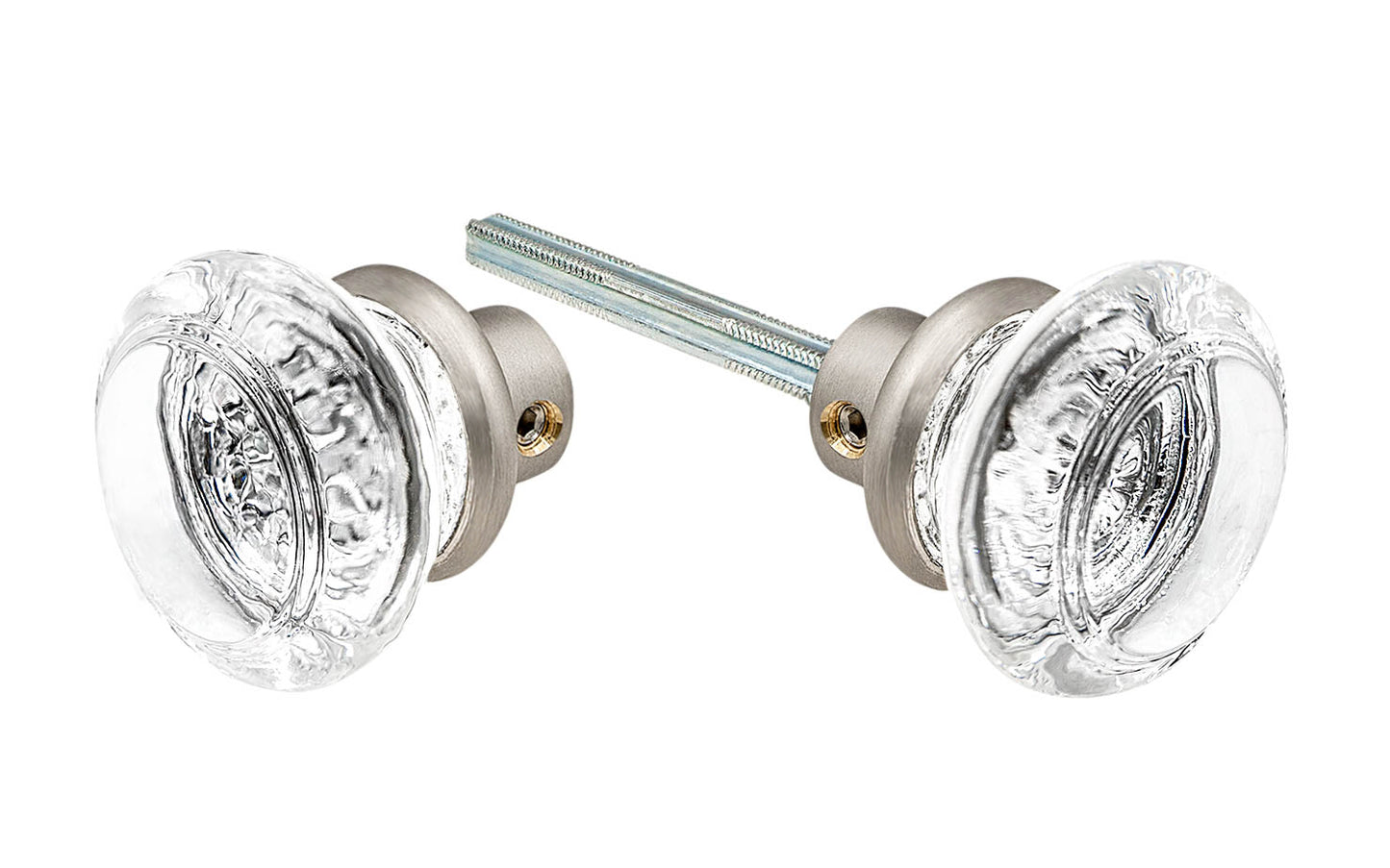 Pair of Classic Round Clear Glass Doorknobs with spindle. A high quality & genuine glass doorknob set with an attractive round design. The sparkling center point under glass amplifies reflected light to showcase beautiful facets. Solid brass base. Reproduction Glass Door Knobs. Traditional Round Glass Knobs. Brushed Nickel Finish.