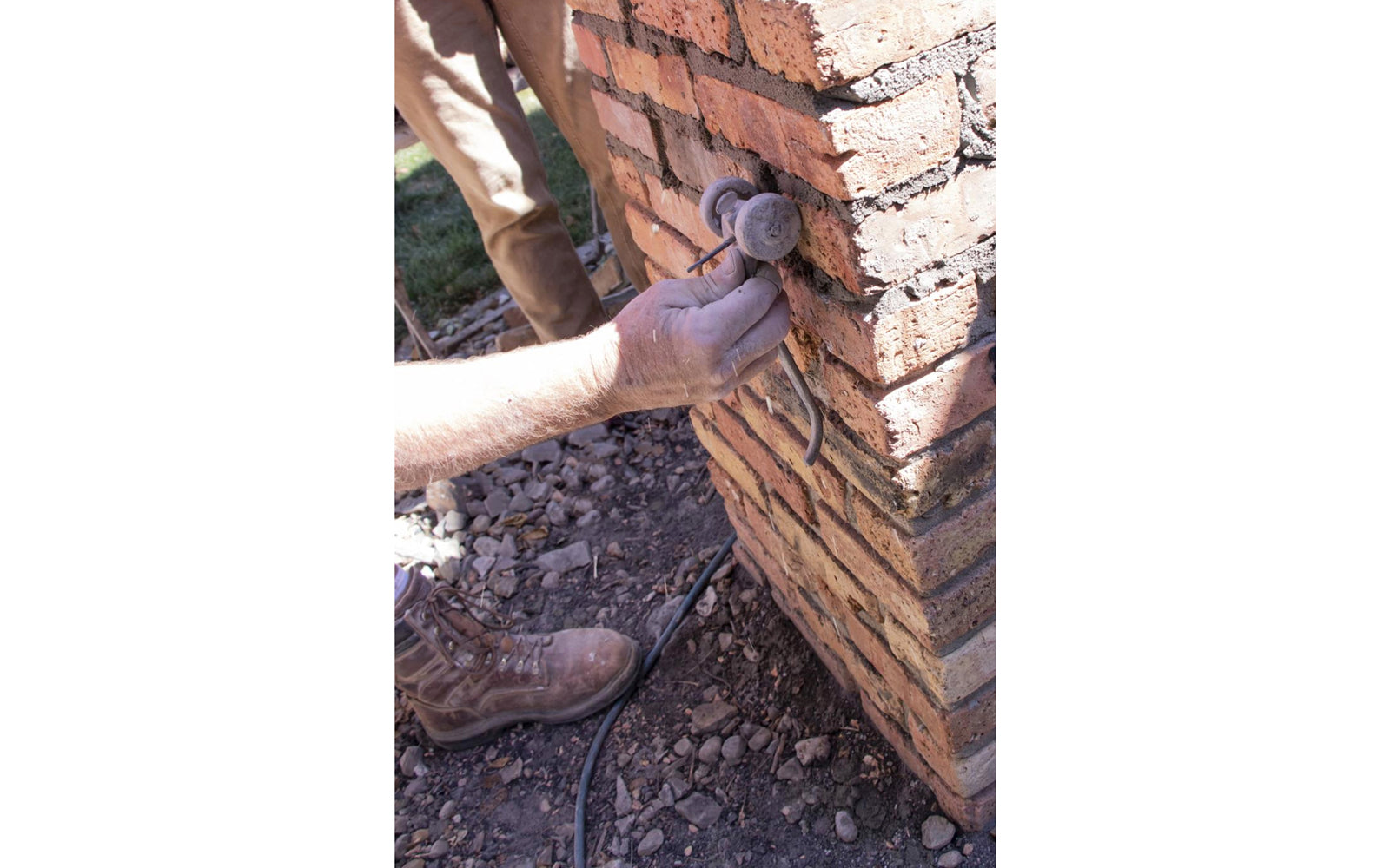 This Marshalltown Joint Raker easily removes excess mortar from between bricks. Use the aluminum handle to push the 1-3/4" skate wheels and a hardened nail that adjusts to clean out joints. 