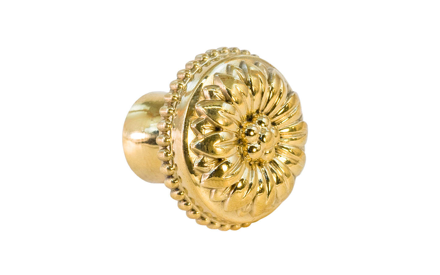 Traditional & classic "French Style" cabinet knob with an elegant flower design & beaded trim. Made of high quality solid brass, his knob has a weighty & durable feel. Great for cabinets, furniture & drawers. The knob is designed in the Late 19th Century style of hardware. Unlacquered brass (will patina over time). Available in 1-1/8" diameter knob & 1-1/2 diameter knob.