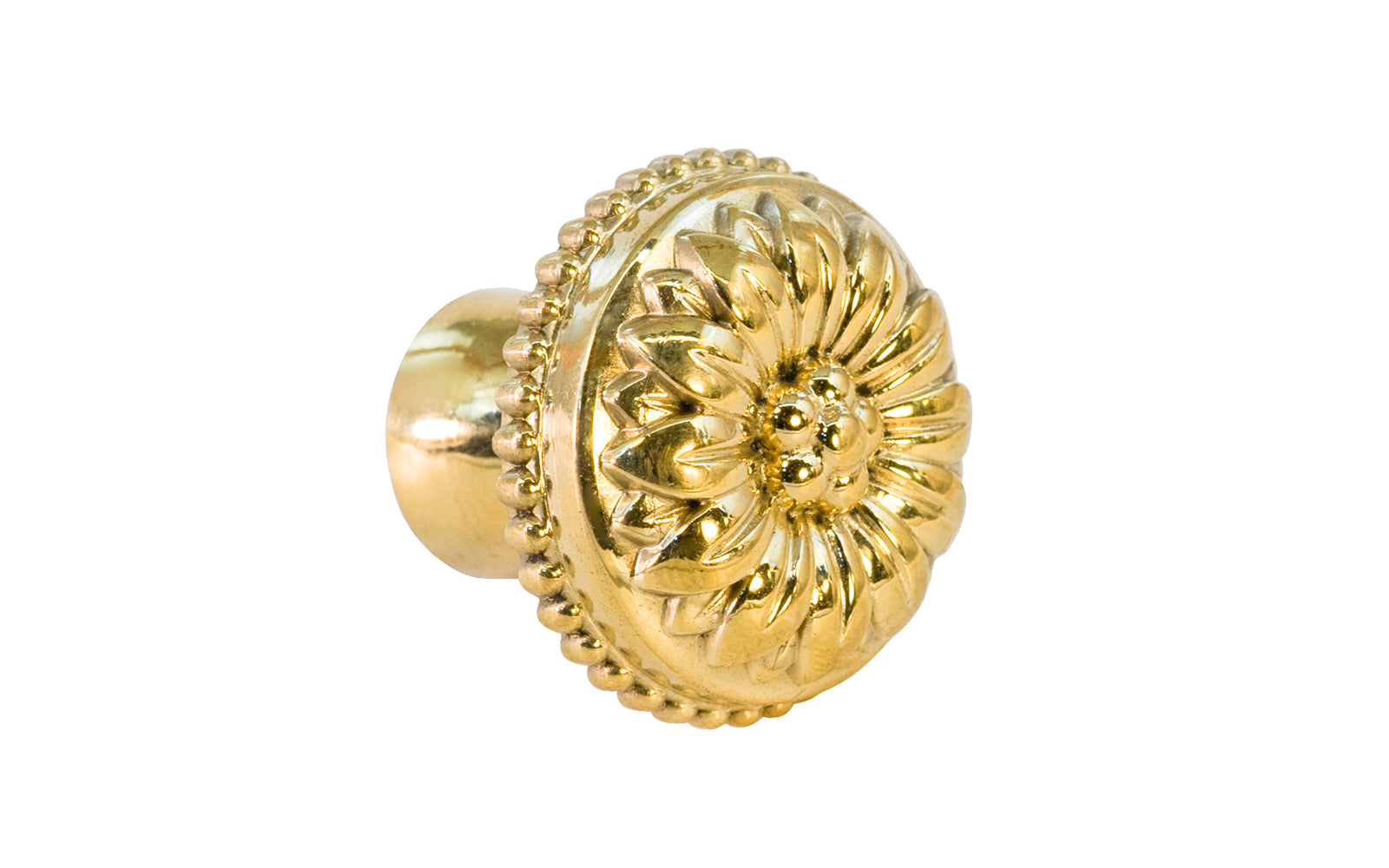 Traditional & classic "French Style" cabinet knob with an elegant flower design & beaded trim. Made of high quality solid brass, his knob has a weighty & durable feel. Great for cabinets, furniture & drawers. The knob is designed in the Late 19th Century style of hardware. Unlacquered brass (will patina over time). Available in 1-1/8" diameter knob & 1-1/2 diameter knob.
