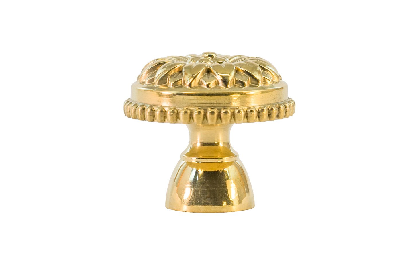 Traditional & classic "French Style" cabinet knob with an elegant flower design & beaded trim. Made of high quality solid brass, his knob has a weighty & durable feel. Great for cabinets, furniture & drawers. The knob is designed in the Late 19th Century style of hardware. Unlacquered brass (will patina over time). Available in 1-1/8" diameter knob & 1-1/2 diameter knob.