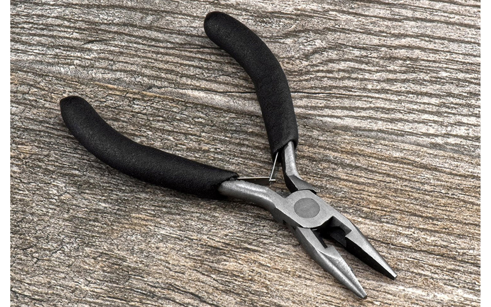 Basic & economy style 5" long needle nose pliers with smooth jaws. 55 HRC. Plier made of carbon steel. Double leaf spring. Made by SE.