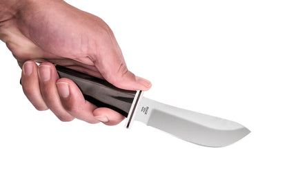 The classic Buck Knives 103 Skinner Fixed Blade Knife is classic, heavy duty skinning knife. The fixed blade was designed for easily skinning game. The tip is narrow, while the curved belly aids in getting through thick layers.  Includes a genuine black leather sheath.   Made in USA. Model 0103BKS-B. 033753026591