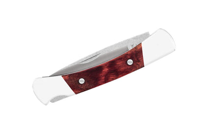 Buck Knives 503 Prince Pocket Folding Knife is a classic, compact everyday carry. Smaller than the "Squire" knife, the Prince knife has a slimline design for easy carry. The lockback design makes it easy to open & close. Handsome DymaLux red wood with nickel silver bolsters. Made in USA. 033753092015. Model 0503RWS-B