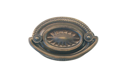 Antique Brass Oval Heppelwhite Drop Pull ~ Traditional Heppelwhite & Sheraton style - Antique Brass Finish ~ Vintage-style Hardware · Traditional & classic ~ Traditional & classic Heppelwhite & Sheraton period style ~ 2" spacing of screw holes ~ Includes an ornate stamped brass backplate ~ Traditional Heppelwhite style, but suitable for different traditional & period decors, including Victorian ~ Ornate style ~ Sunburst 