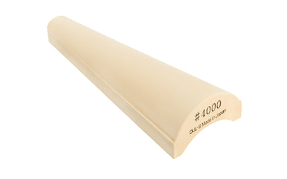 Japanese Suehiro Gouge Whetstone - 4000 Grit. Tapered whetstone is designed to sharpen implements from gouging tools to carving knives. Designed for rounded blades of various sizes. Tapered Japanese Waterstone. Model 2HS-3. 4966684065529. Made in Japan. Super fine grit. Includes an eraser for removing grime
