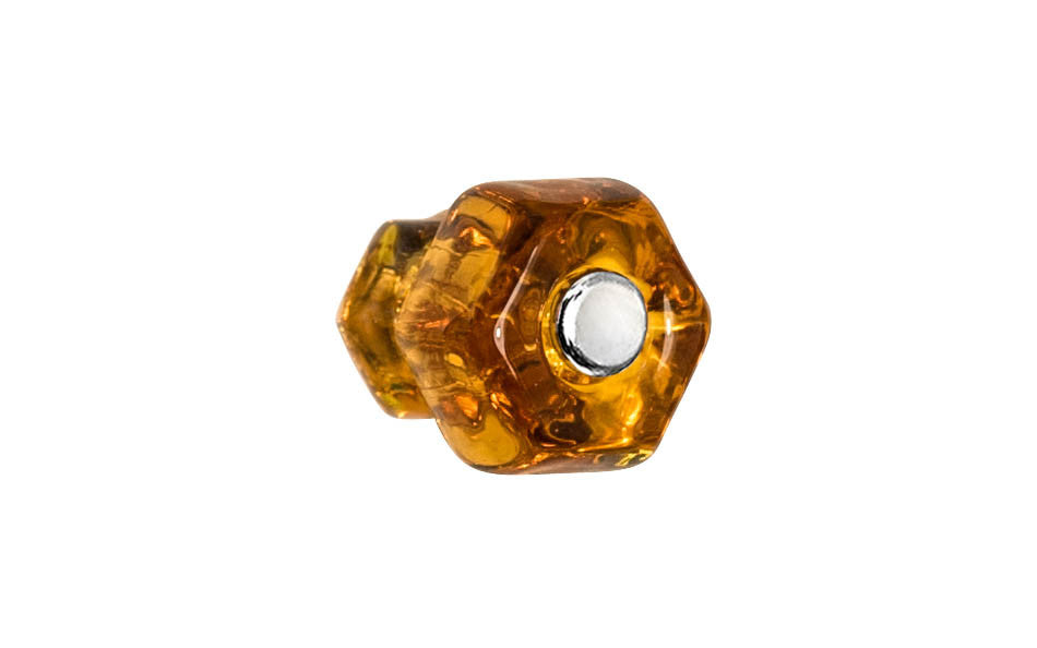 Vintage-style Hardware · Classic & original-style hexagonal glass cabinet knob with a silver pan head thru-bolt. Made of genuine glass. Amber color glass. Includes a silver pan thru-bolt. Reproduction hexagonal classic glass knob. Traditional hex glass knob. 1" Diameter Knob