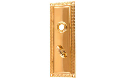 Brass Escutcheon Door Thumb Turn Plate ~ Non-Lacquered Brass (will patina naturally over time) ~ Vintage-style Hardware · Decorative beaded design ~ Quality stamped brass material ~ 7" high x 2-1/2" wide ~ For solid or pre-bored (2-1/8") hole doors