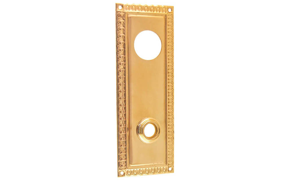 Brass Escutcheon Keyway Cylinder Door Plate ~ Non-Lacquered Brass (will patina over time) ~ Vintage-style Hardware · Decorative beaded design ~ Quality stamped brass material ~ 7" high x 2-1/2" wide ~ For solid or pre-bored (2-1/8") hole doors