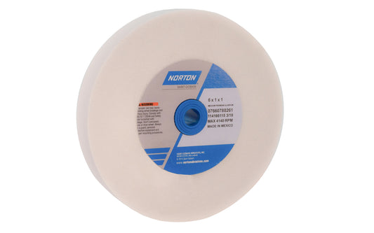 6" Aluminum Oxide Bench Grinding Wheel made by Norton. Designed for general purpose grinding on steel, high speed steels, & ferrous metals. Used for sharpening edges on tools. Materials that can be worked on include:  6" diameter of wheel. 1" thickness. 60 grit.  