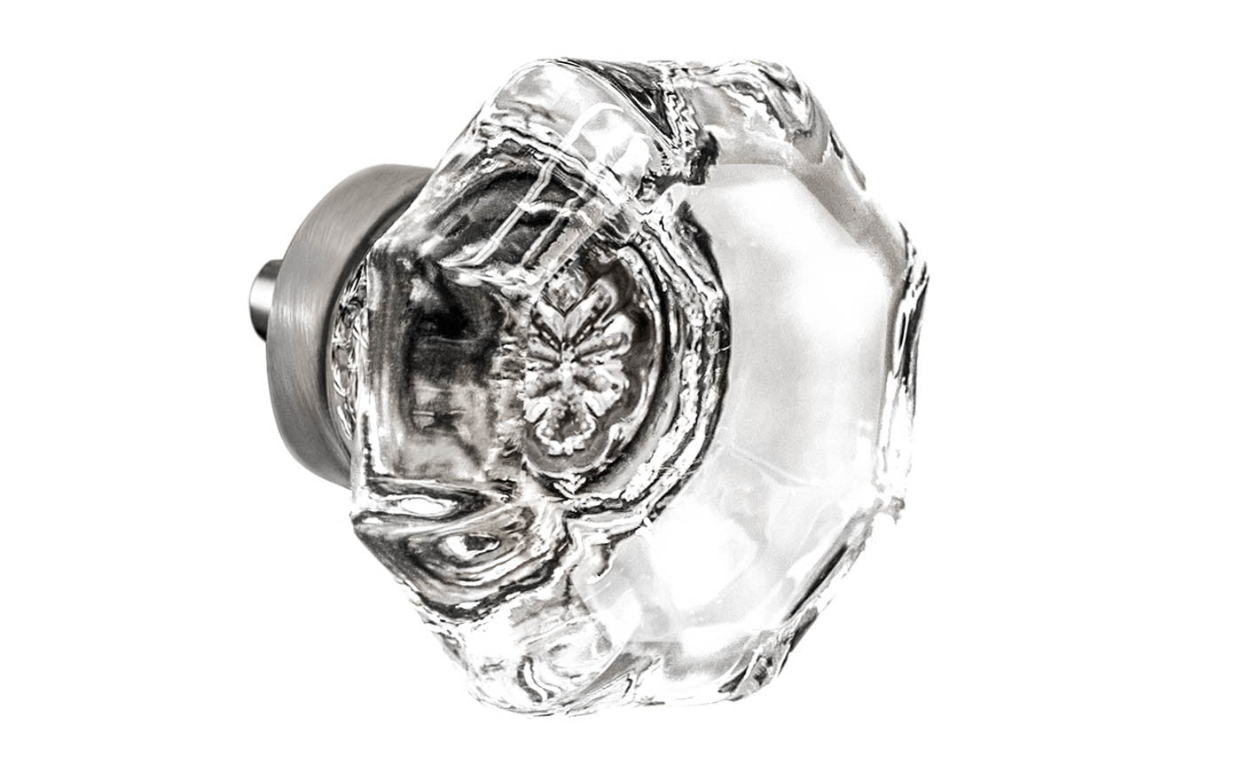Elegant & classic octagonal cabinet glass knob with attractive genuine clear glass. The glass is carefully set into a handsome solid brass base with a threaded shank in the back. Brushed nickel finish on solid brass base. Octagon shape knob. 1-1/2" Diameter Knob 