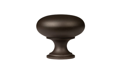 Vintage-style Hardware · Traditional & Classic Brass Knob with an Oil Rubbed Bronze Finish. 1-1/4" diameter size knob. Made of high quality brass, this stylish round cabinet knob has a smooth look & feel on a pedestal shaped base. Works great in kitchens, bathrooms, on furniture, cabinets, drawers. Authentic reproduction hardware. 