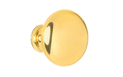 Vintage-style Hardware · Traditional & Classic Unlacquered Brass Knob. 1-1/2" diameter size knob. This stylish round cabinet knob has a smooth look & feel on a pedestal shaped base. Great for kitchens, bathrooms, furniture, cabinets, drawers. Non-lacquered brass (un-lacquered brass will patina). Authentic reproduction hardware.