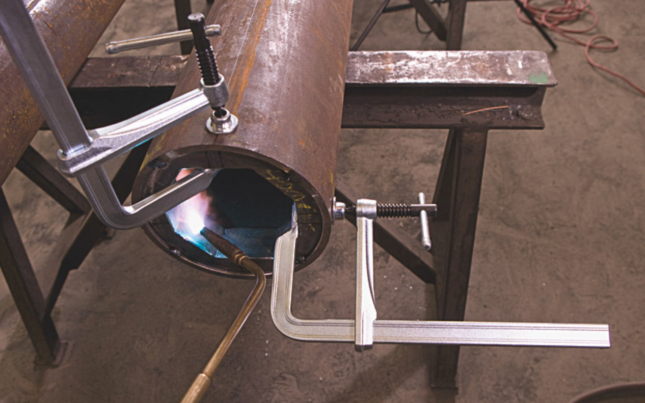 This 8" Bessey All-Steel "F-Style" Bar Clamp 1200-S8 has a patented rail profile that offers more clamp force with fewer spindle turns. U-shaped sliding arm offers straight line power for great stability. Heat treated, high carbon Acme threaded screw is tempered & quenched, which gives greater load capacity.