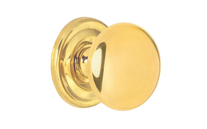 Vintage-style Hardware · Classic & traditional solid core unlacquered solid brass cabinet knob. 1-1/4" diameter knob. Made of a quality solid brass core, this stylish knob has a smooth & weighty feel & comes with an optional rosette backplate piece. Non-lacquered brass (the unlacquered brass will patina over time). Great for kitchens, bathrooms, on furniture, cabinets, drawers, small doors, cabinet doors