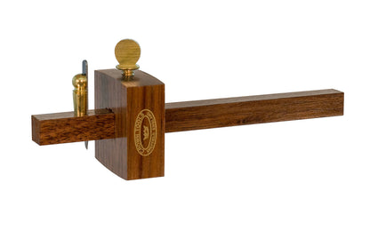Model 143M. This mini Walnut cutting gauge by Crown Tools is good for marking accurate lines across grain without tearing, & is a good tool for cutting veneers as well. The high carbon steel cutting blade is held in place with a brass wedge. Walnut wood.  Made in England.