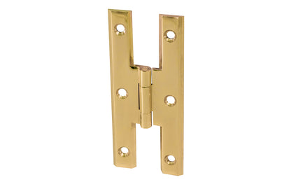High quality & classic solid brass cabinet hinge in the traditional "H" style with bevelled edges. The leafs are thick & the hinge has a lacquered brass finish. Designed in the vintage "Colonial Revival" style, but suitable for modern decors. 1-1/2" high x 1-1/2" wide. H hinge for cabinets. Flush surface mount.