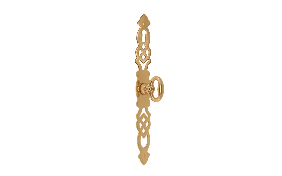Solid Brass Keyhole Cabinet Door Pull with 6-3/4" Backplate designed in the Chippendale Style. Designed for China cabinets, large cabinets, wardrobes, drop fronts, entertainment centers, etc. Lacquered brass finish. Cast brass key bow is 1-1/8" high, projects 1-1/16"