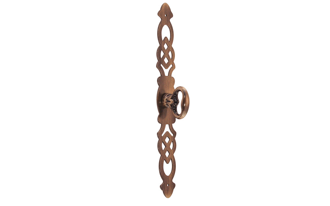 Solid Brass Cabinet Door Pull with 6-3/4" Backplate designed in the Chippendale Style. Designed for China cabinets, large cabinets, wardrobes, drop fronts, entertainment centers, etc. Antique brass finish. Cast brass key bow is 1-1/8" high, projects 1-1/16"
