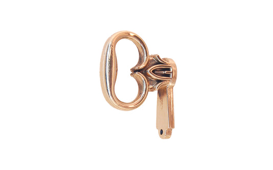 Solid Brass Mock Key for Cabinet Doors. Commonly used on Colonial Revival secretaires, highboys, China cabinets, etc. Non-lacquered brass cabinet pull. Bow 1-1/8" wide, 1" projection