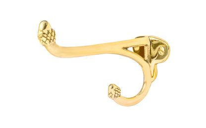Vintage-style unlacquered solid brass hook with acorn tip. Excellent for use in hallways, hall trees, kitchens, bathrooms. The double hook is made of solid brass material, great for heavy coats & clothing. Designed in the Victorian, Late 19th Century, Early 20th Century style hardware. 3-3/4" projection. Non-lacquered brass