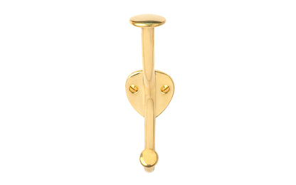 Vintage-style unlacquered solid brass hall tree hook. Excellent for use in hallways, hall trees, kitchens, & many other places. The double hook is made of solid brass material, making it great for coats & clothing. Designed in the Art Nouveau, Early 20th Century style hardware. 5-1/4" high hook. Non-lacquered brass.