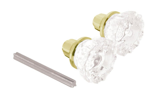 Glass Door Knob Set with Brass Finish. A basic & economy glass doorknob set with lacquered bright brass finish. 2" diameter knob. Fluted knob style. Set includes two knobs & 3-1/2" long spindle. Defender Security Model E 28316.