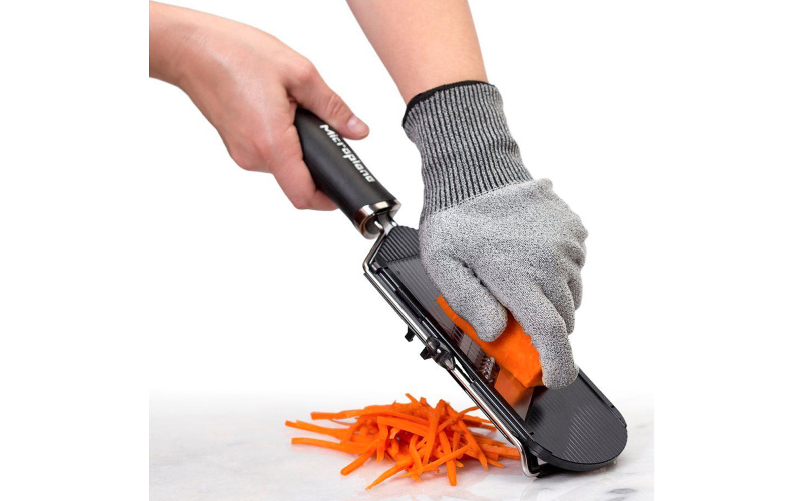 Microplane Cut Resistant glove - Model 34007 - Protects fingers & knuckles from grater blades - Medium and Large Size Glove - Fits both Right & Left hands - Easy to clean: Machine washable, drip dry - MED Size - LG Size - Protects hand from sharp Microplane tools - FDA compliant - Cut proof glove - Safety glove 
