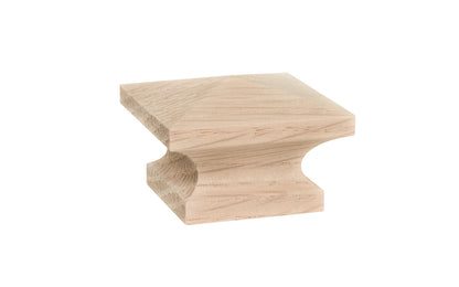A classic wood pyramid cabinet knob of solid oak material.  This good-looking wooden knob has a slight pyramid design & square edges. Designed in the Mission-style / Arts & Crafts, Craftsman style of hardware. Unfinished solid oak wood. May be stained, painted, or varnished. 1-1/4" size knob