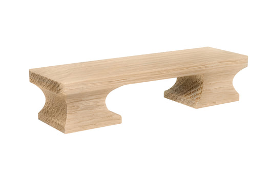 A classic square-edged handle pull made of solid oak material. 3" on centers. This good-looking wood handle has a slight pyramid design & square edges. Designed in the Mission-style / Arts & Crafts, Craftsman style of hardware. 3" spacing of screw holes. Unfinished solid oak wood. May be stained, painted, or varnished.