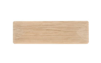 A classic square-edged handle pull made of solid oak material. 3" on centers. This good-looking wood handle has a slight pyramid design & square edges. Designed in the Mission-style / Arts & Crafts, Craftsman style of hardware. 3" spacing of screw holes. Unfinished solid oak wood. May be stained, painted, or varnished.