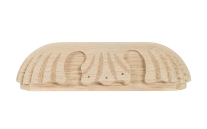 A traditional & intricate design carved oak wood handle pull with 3-3/4" on centers. Made of unfinished solid oak wood, this handle has a smooth feel & nice-looking grain to it. It may even be stained, painted, or varnished if desired. 3-3/4" spacing of screw holes. Solid oak pull.