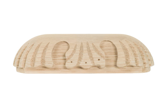 A traditional & intricate design carved oak wood handle pull with 3-3/4" on centers. Made of unfinished solid oak wood, this handle has a smooth feel & nice-looking grain to it. It may even be stained, painted, or varnished if desired. 3-3/4" spacing of screw holes. Solid oak pull.