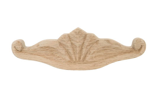 A traditional & intricate design carved oak wood handle pull with 3" on centers. Made of unfinished solid oak wood, this handle has a smooth feel & nice-looking grain to it. It may even be stained, painted, or varnished if desired. 3" spacing of screw holes. Solid oak pull.