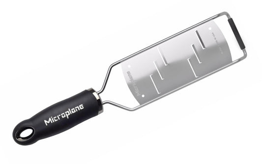 Made in USA - Blade made in USA - Great for shaving hard cheese, cucumber, chocolate, garlic, ginger - Non-slip grip - Dishwasher safe - Razor-sharp blades made from stainless steel - 18/8 grade - Ergonomic handle ~ No-slip base - Microplane Gourmet Series - Gourmet Shaver Grater - Model 45006 - Microplane Large Shaver - 098399450063