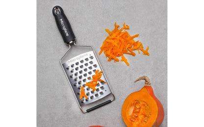Made in USA - Blade made in USA - Great for Apples, Cabbage, Carrots, Hard & Soft Cheeses, Pumpkin, Onions, & Zucchini - Non-slip grip - Dishwasher safe - Razor-sharp blade made from stainless steel - 18/8 grade - 4" wide blade ~ No-slip base - Gourmet Series Ultra Coarse Grater - non-skid foot - 45011 - Comfort Handle - 098399450117