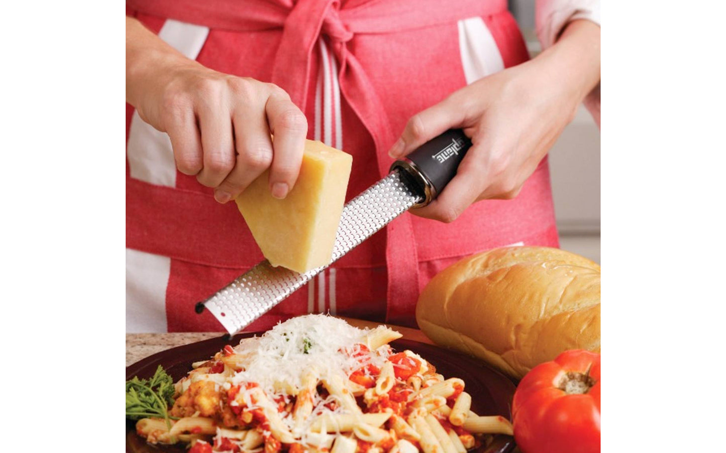 Made in USA - Blade made in USA - Great for grating hard cheeses & Citrus - Non-slip grip - Dishwasher safe - Sharp blades made from stainless steel - 18/8 grade - Ergonomic handle ~ No-slip base - Lemon Zester - Lime Zester - Microplane Fine Zester - Fine Grating - Microplane Premium Zester - Parmesan Reggiano Grater - Model 46020