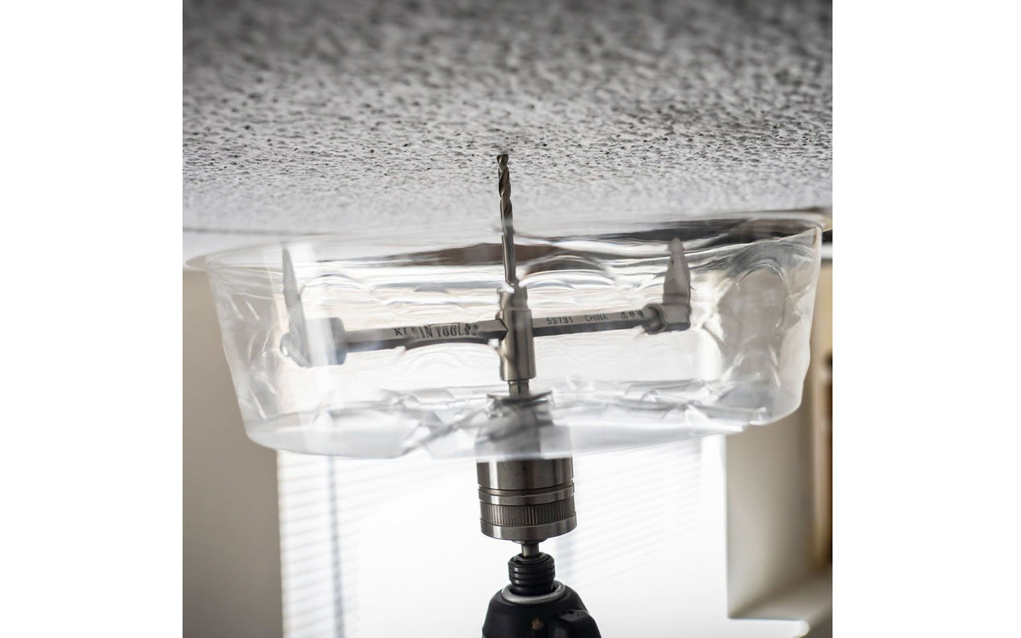 Adjustable Hole saw from Klein Tools quickly & smoothly cuts clean holes in drywall & ceiling tiles. Applications include can lights, speaker holes & sprinkler systems. Blades adjust to cut holes from 2" (51 mm) to 7" (178 mm) in diameter. Fits most 3/8" & 1/2" drill chucks. Klein Tools Adjustable Hole Saw Model 53731.