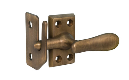Classic & Traditional Solid Brass Casement Window Latch ~ Large Size. 2" high x 1-1/8" wide latch turn base. Locks & tightens window frames or small doors. Reversible for right or left applications. Vintage-style casement window lock. Antique Brass Finish.