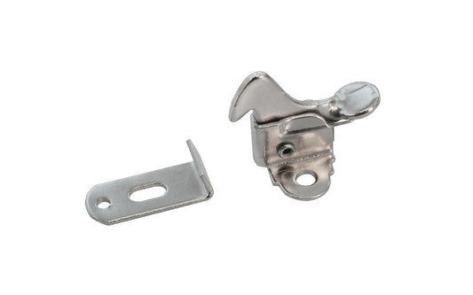 An old-style spring-loaded steel elbow catch for cabinet doors. Secures one door when there is no frame between the two doors. Wrought steel. Polished nickel finish.  Base 1-1/8″ wide